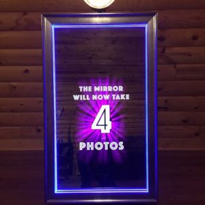 Meet the newest member of our family! Our Mirror Booth looks like a full length mirror with a digital camera behind the glass to take your selfie while images flash with instructions and words of encouragement.